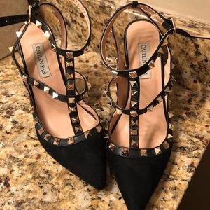 Black suede scrappy heels with gold studs